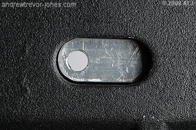 Spacer in hole of tray base