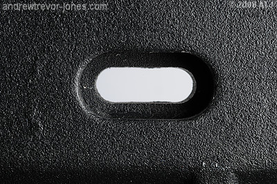 Hole in housing tray base
